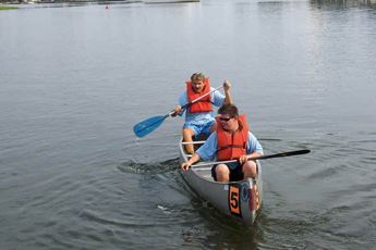 Racers in their boat